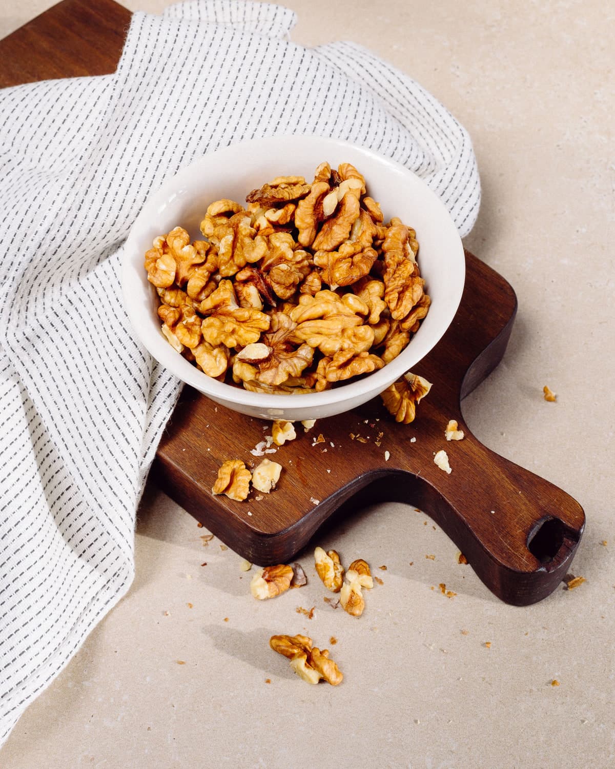 BM Lakin walnut kernels in a white bowl