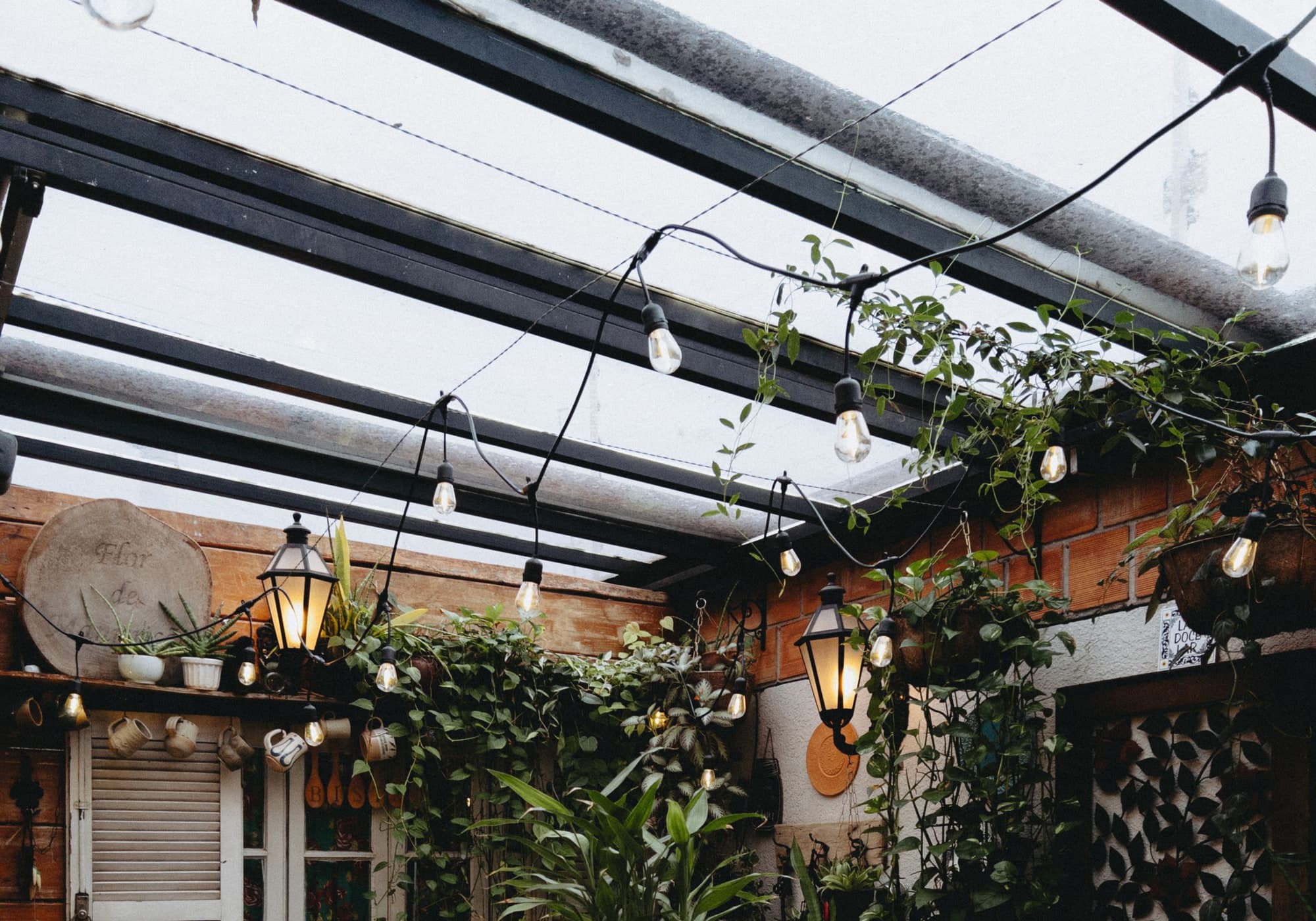 A long table in a planted terrace